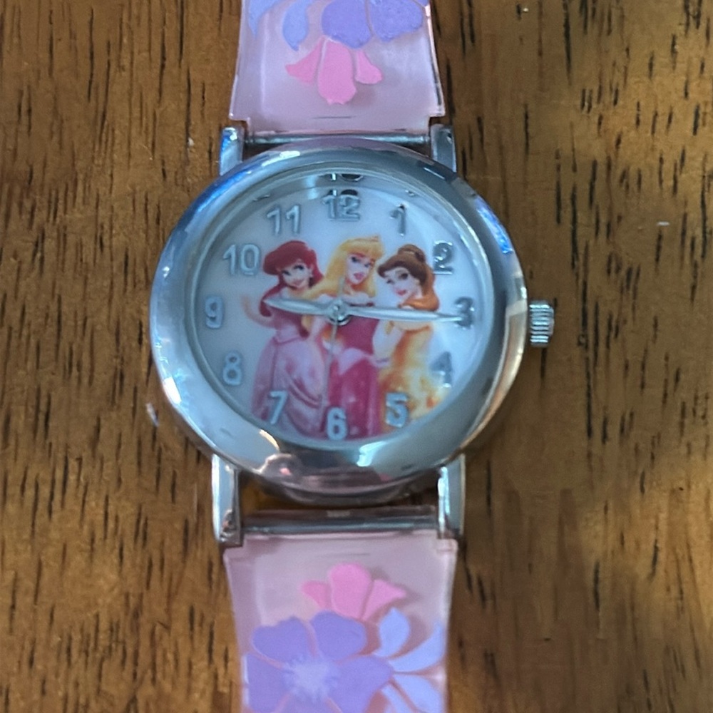 Disney WORKS! princess watch. Belle, Ariel and Aurora on face with silver bezel